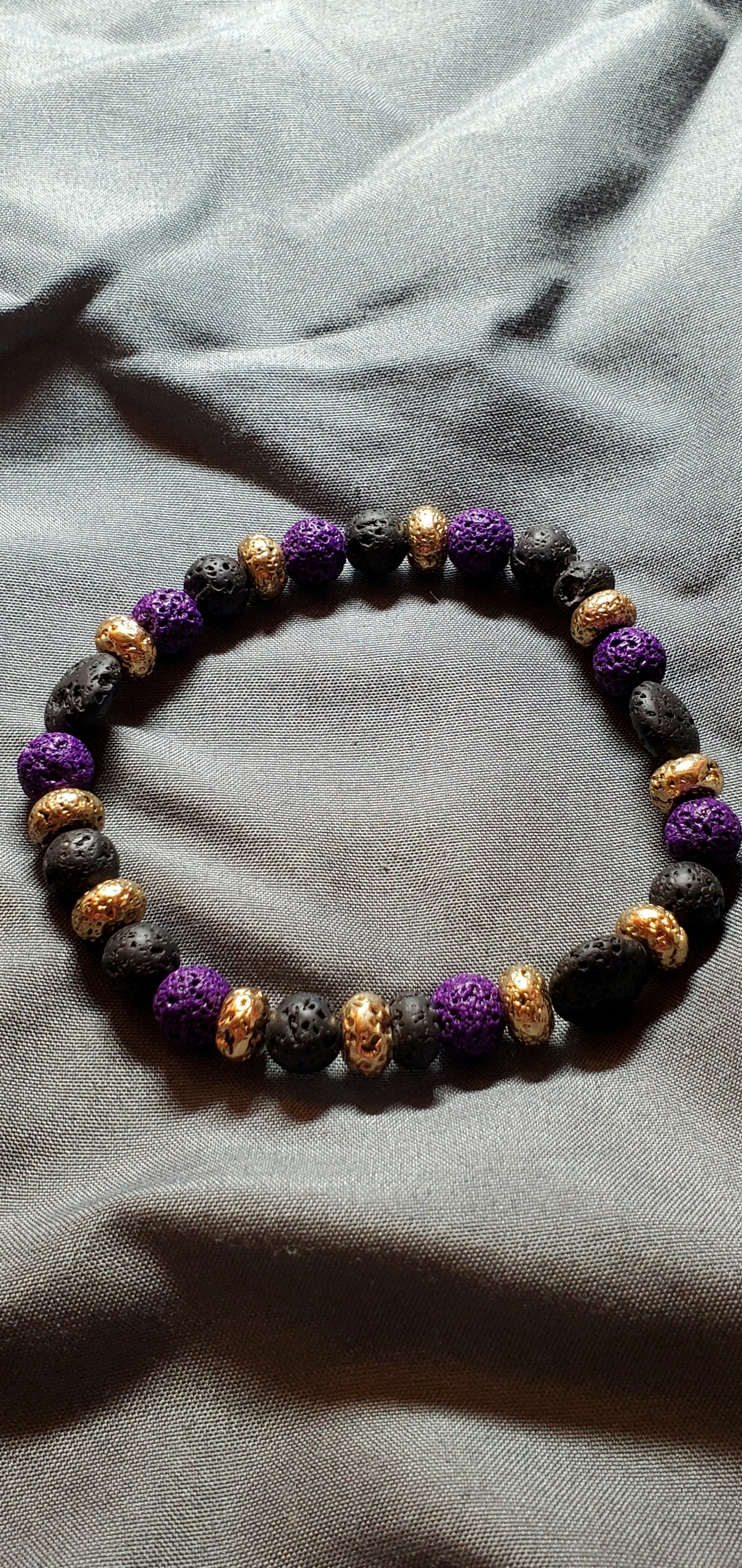 Tri Color Lava Rock(Gold Leafed, Purple, And Black) Stretch Bracelet